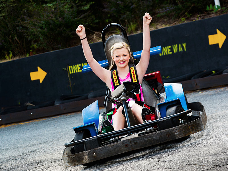 Girl riding Go Kart